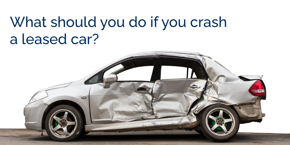 Picture of a silver car that's been in a bad car accident. Text says "What should you do if you crash a leased car?"